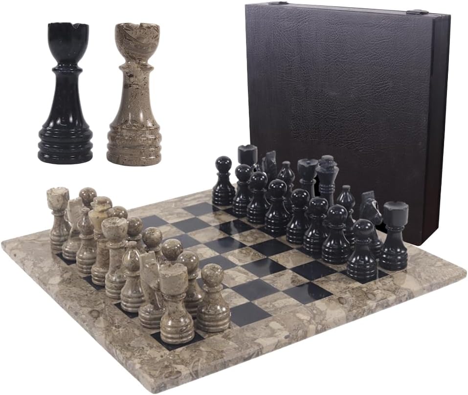 A handmade marble chess set on a 15-inch board with 34 pieces, including two bonus queens, displayed with a dark-stained wooden storage box.