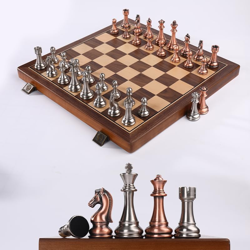 Wooden chessboard with metal chess pieces 