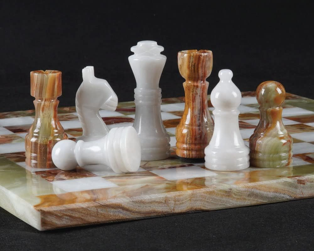 Set of chess pieces on a checkered board 