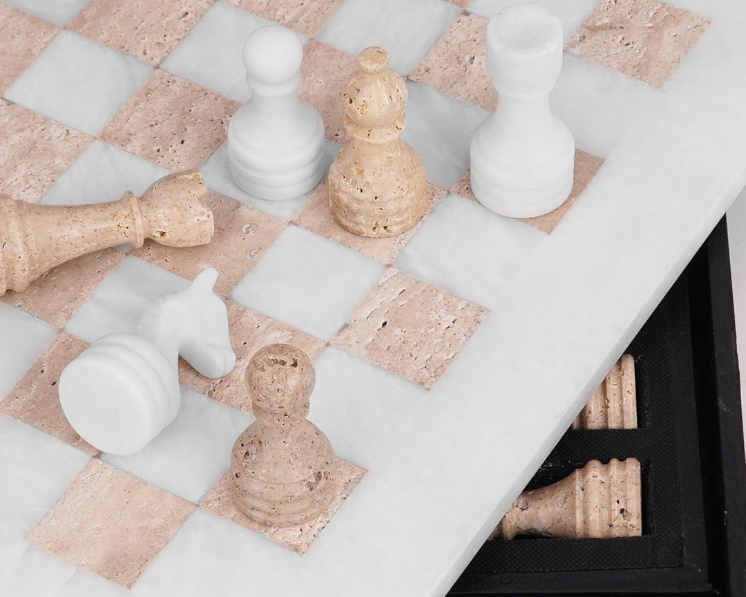 Marble chessboard with stone chess pieces on a white background