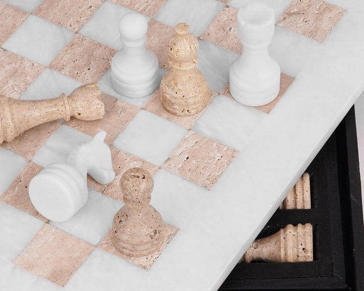 Marble chessboard with stone chess pieces on a white background