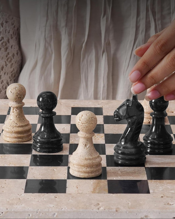 Hand moving a chess piece on a checkered board with 'Speeshstones' branding.