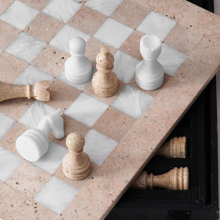 Checkered surface with marble-like pattern and chess pieces on a stone-like material.