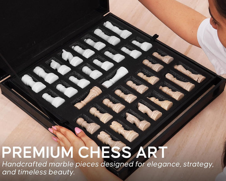 Person opening a black box containing marble chess pieces with 'Speshstones' branding.